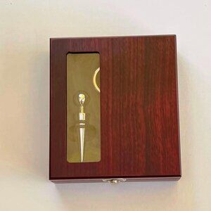 New wooden box with wine tools